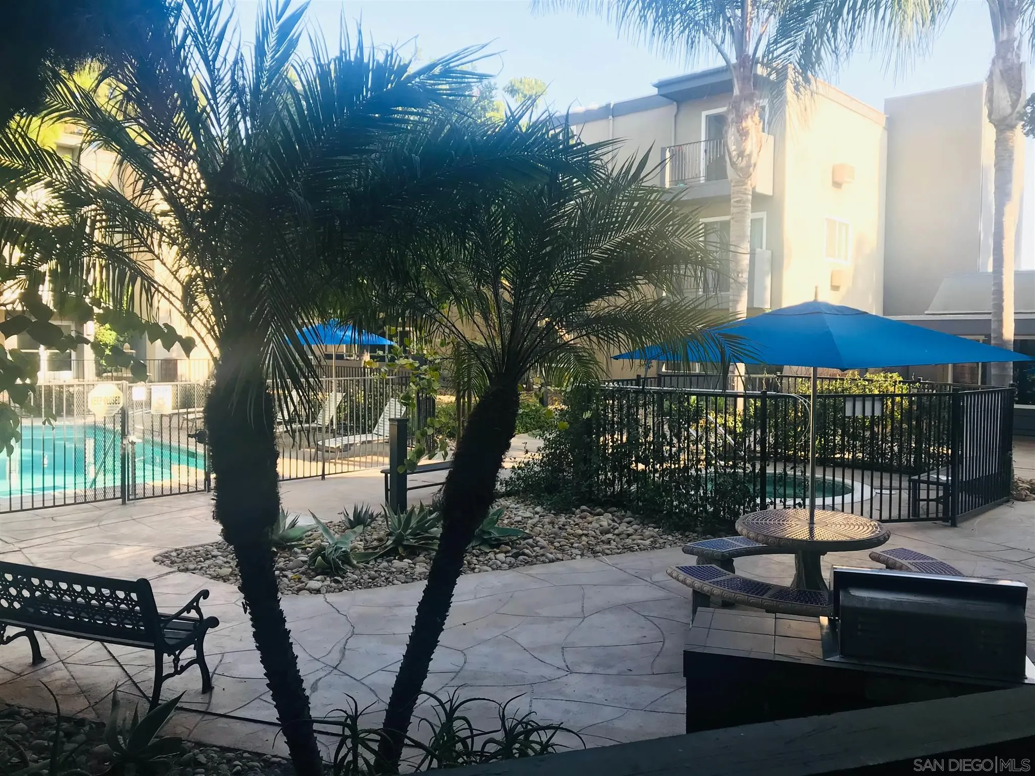 4860 Rolando Court, Unit 20 San Diego, CA 92115 - Photo 5 of 23 a view of a patio with iron fence