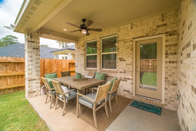 a view of a dining room and livingroom with furniture