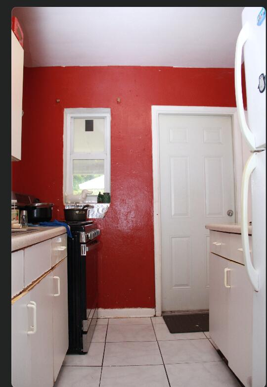 1402 South C Street Lake Worth Beach, FL 33460 - Photo 24 of 27 a room with storage and utility