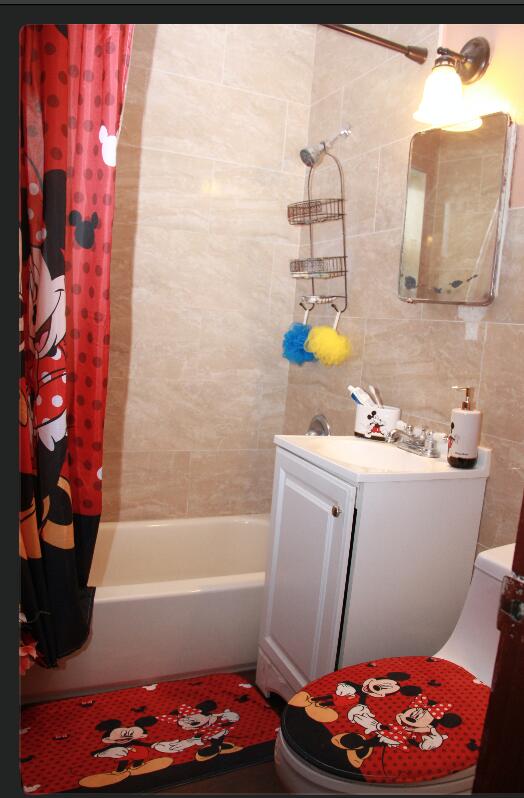 1402 South C Street Lake Worth Beach, FL 33460 - Photo 27 of 27 a bathroom with a sink toilet and bathtub