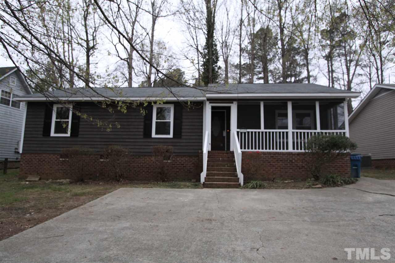 845 Horton Road Durham, NC 27704 - Photo 1 of 14 a house with trees in front of it