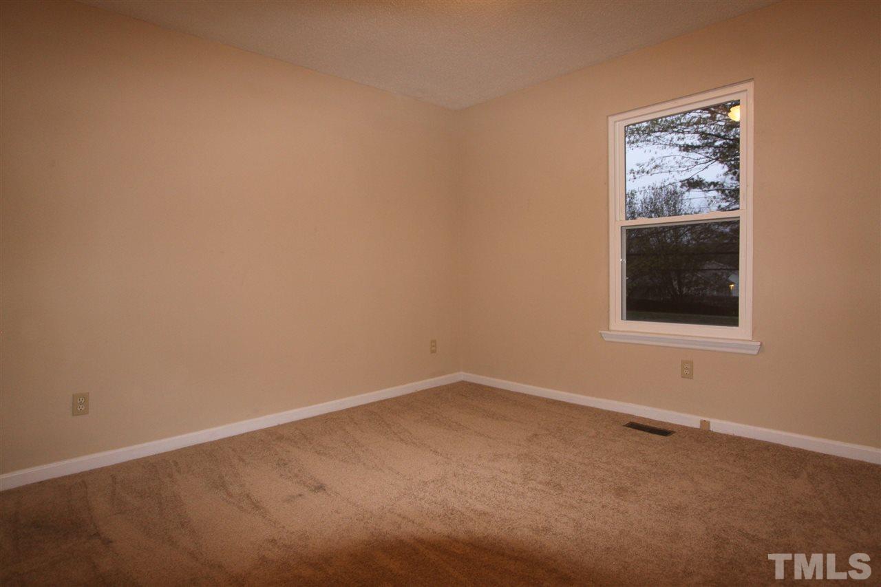 845 Horton Road Durham, NC 27704 - Photo 5 of 14 an empty room with a window