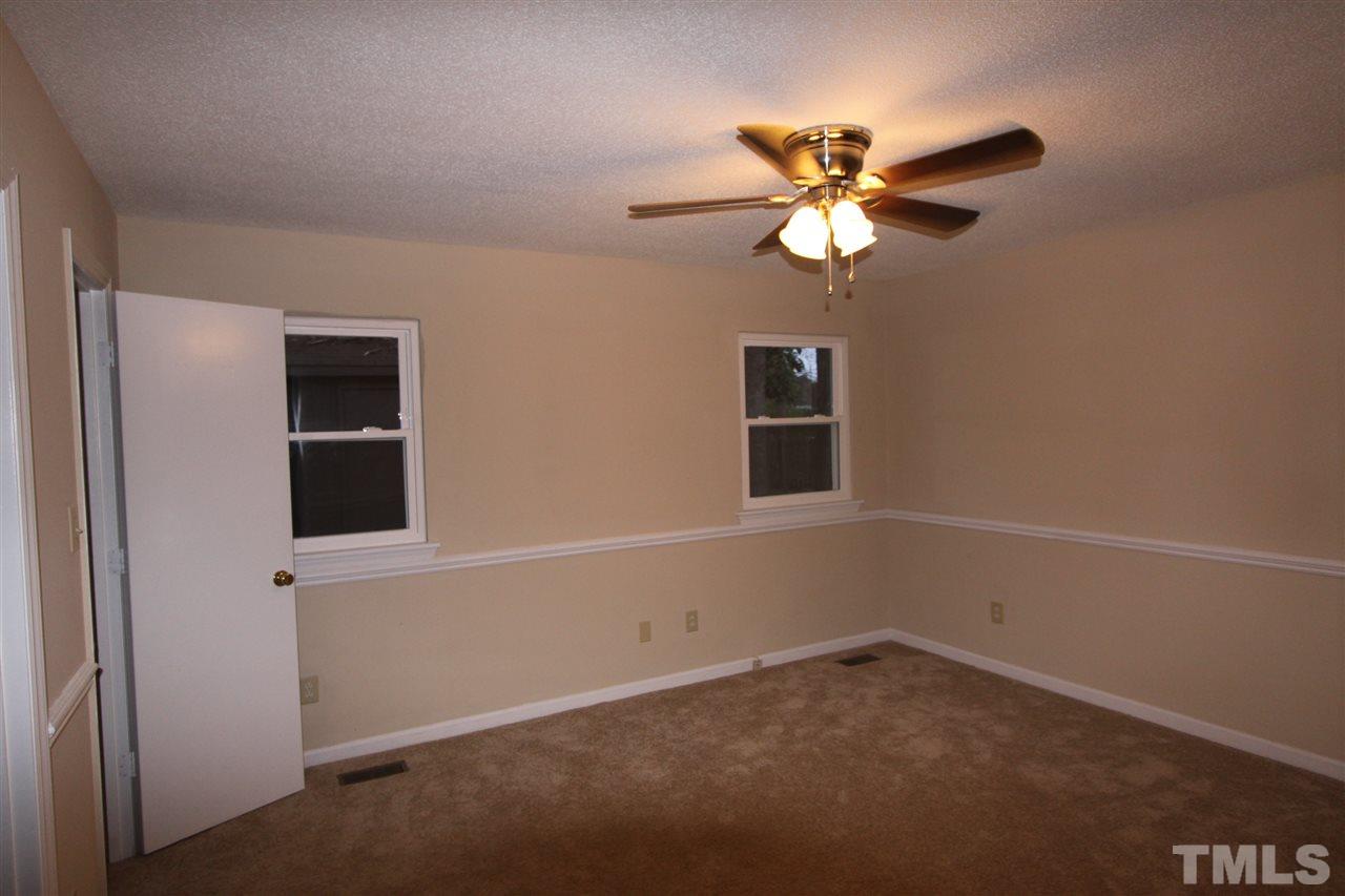 845 Horton Road Durham, NC 27704 - Photo 6 of 14 a view of an empty room with a window