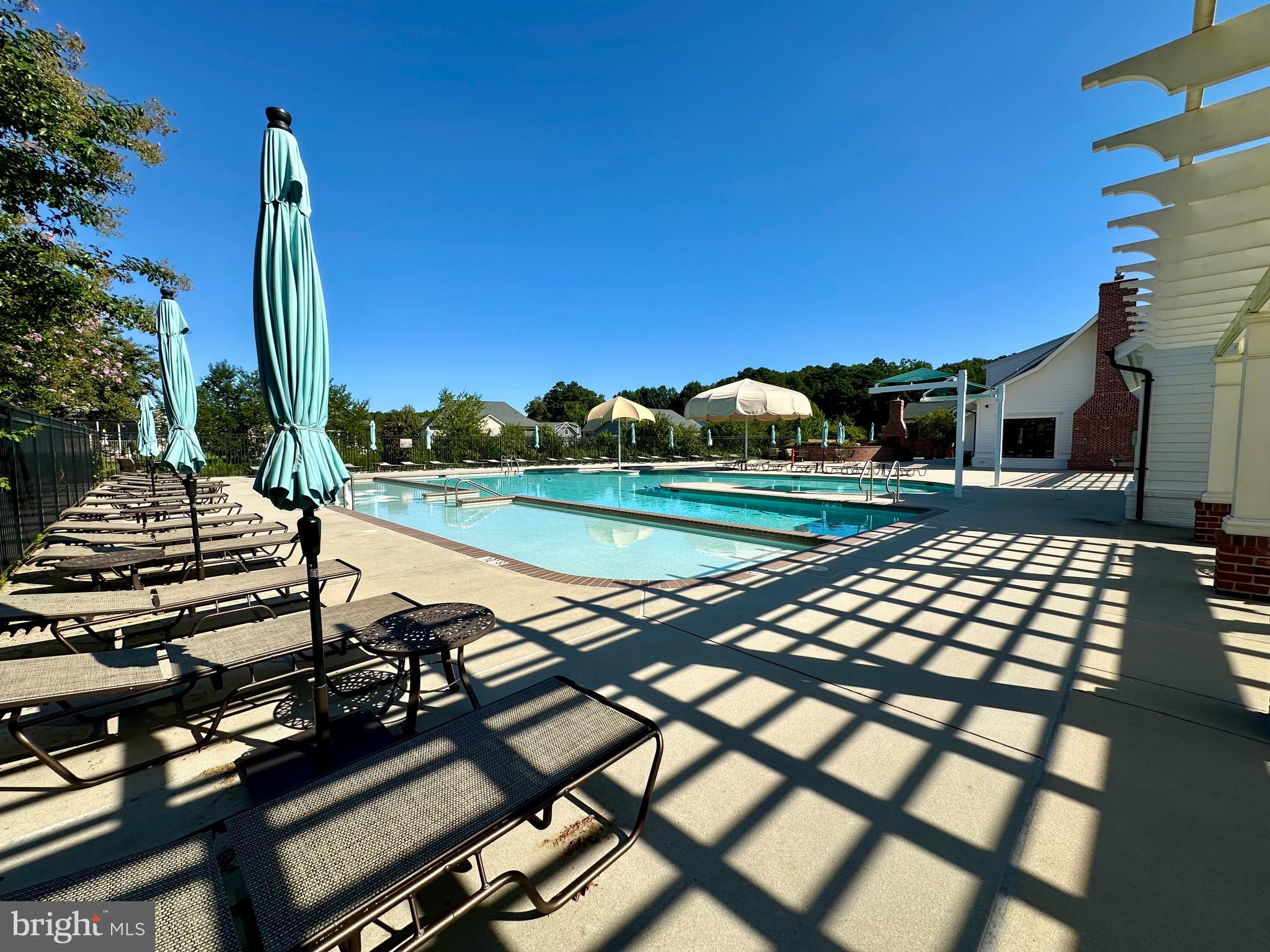 23549 Robalo Road Frankford, DE 19945 - Photo 50 of 53 Huge Pool with Ocean Access & Lounges in Water
