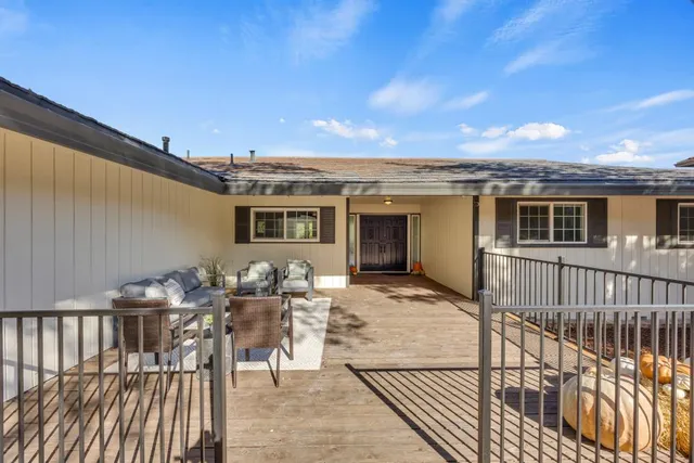a view of a room with wooden floor closet and windows