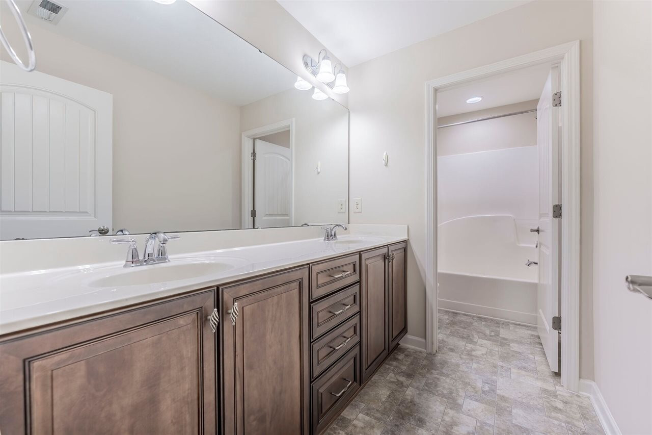 2431 Swans Rest Way Raleigh, NC 27606 - Photo 20 of 25 Shared Bathroom