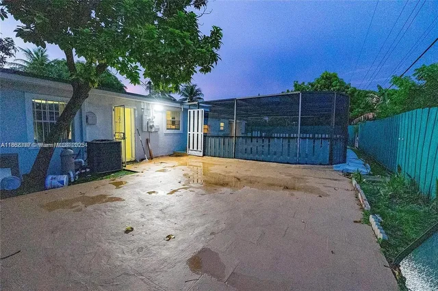 a view of backyard with green space