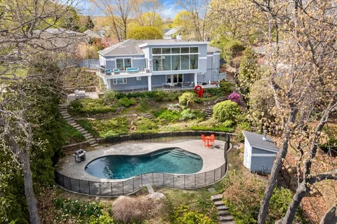 a view of a house with a sink and a yard