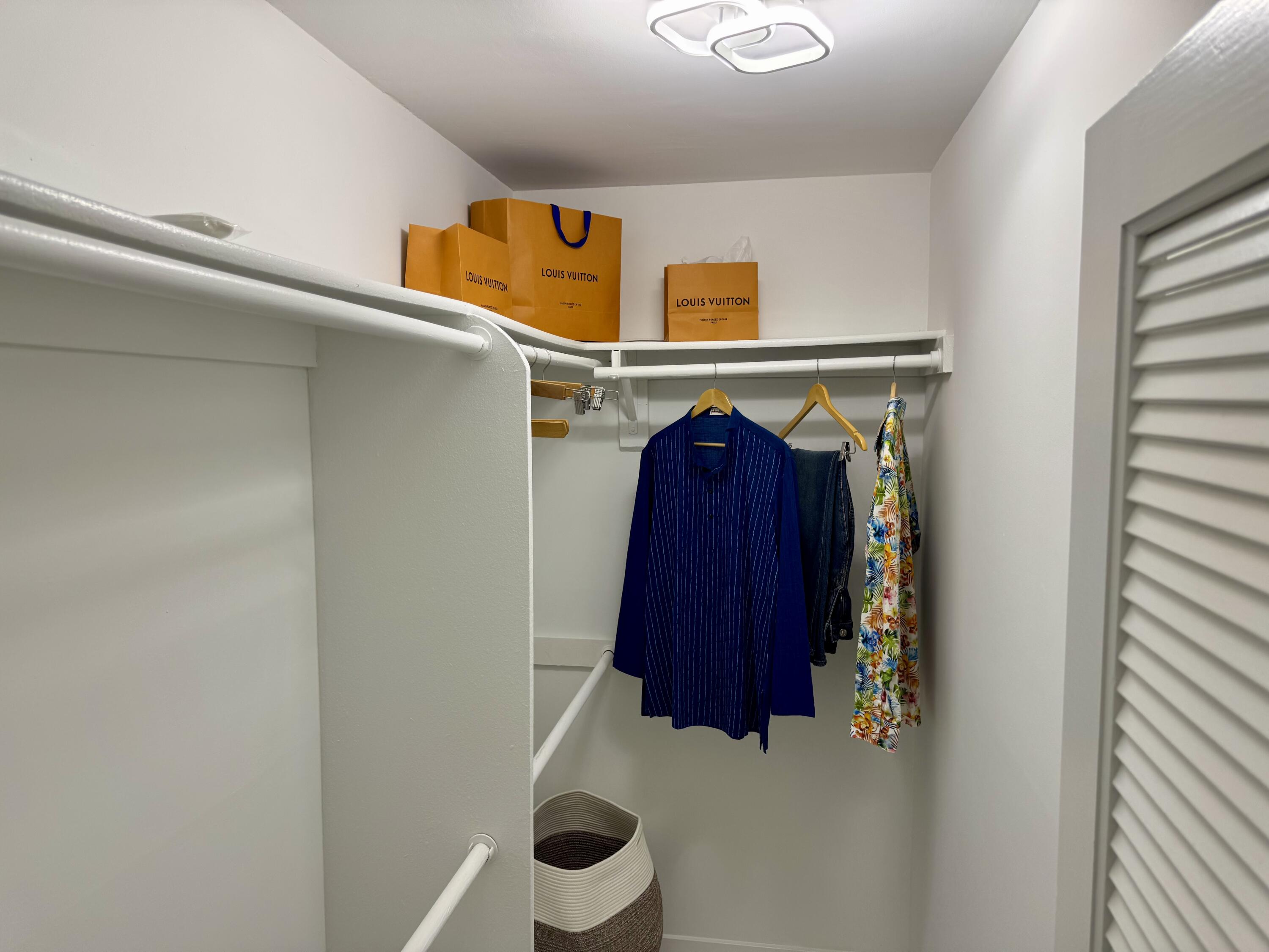 541 Normandy L Delray Beach, FL 33484 - Photo 18 of 55 a utility room with dryer and washer
