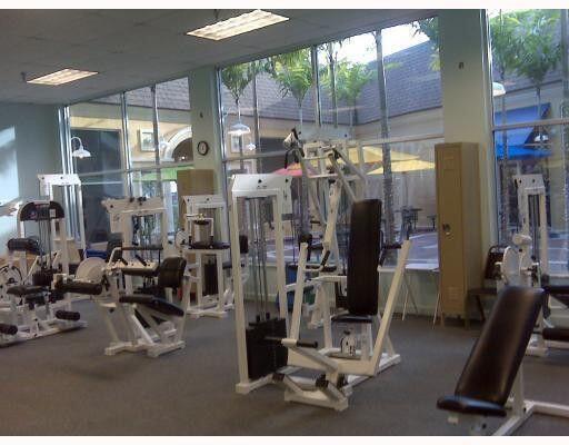 541 Normandy L Delray Beach, FL 33484 - Photo 28 of 55 a view of a room with gym equipment