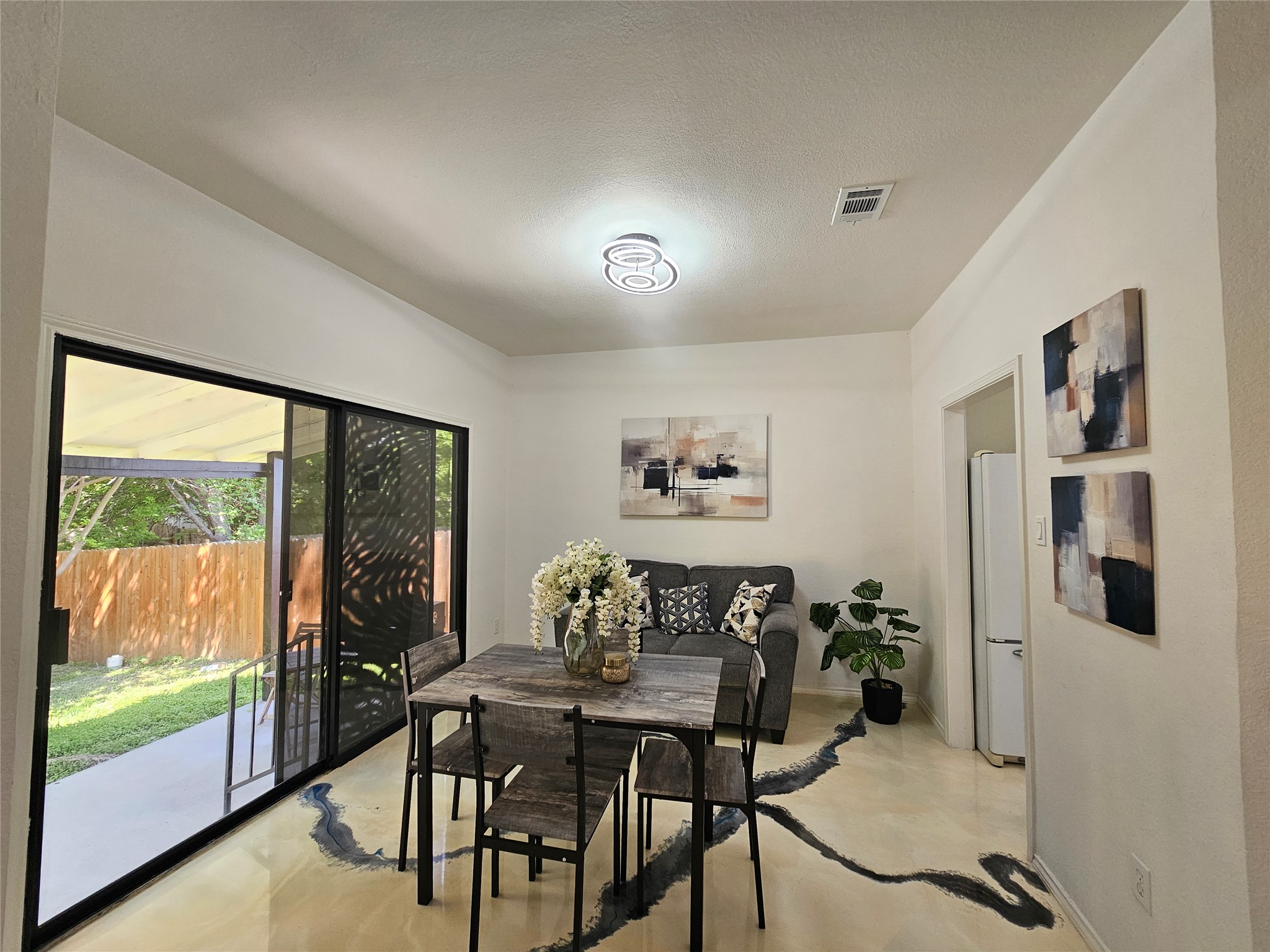 11806 Prairie Hen Lane Austin, TX 78758 - Photo 6 of 16 a view of a livingroom with furniture window and outside view
