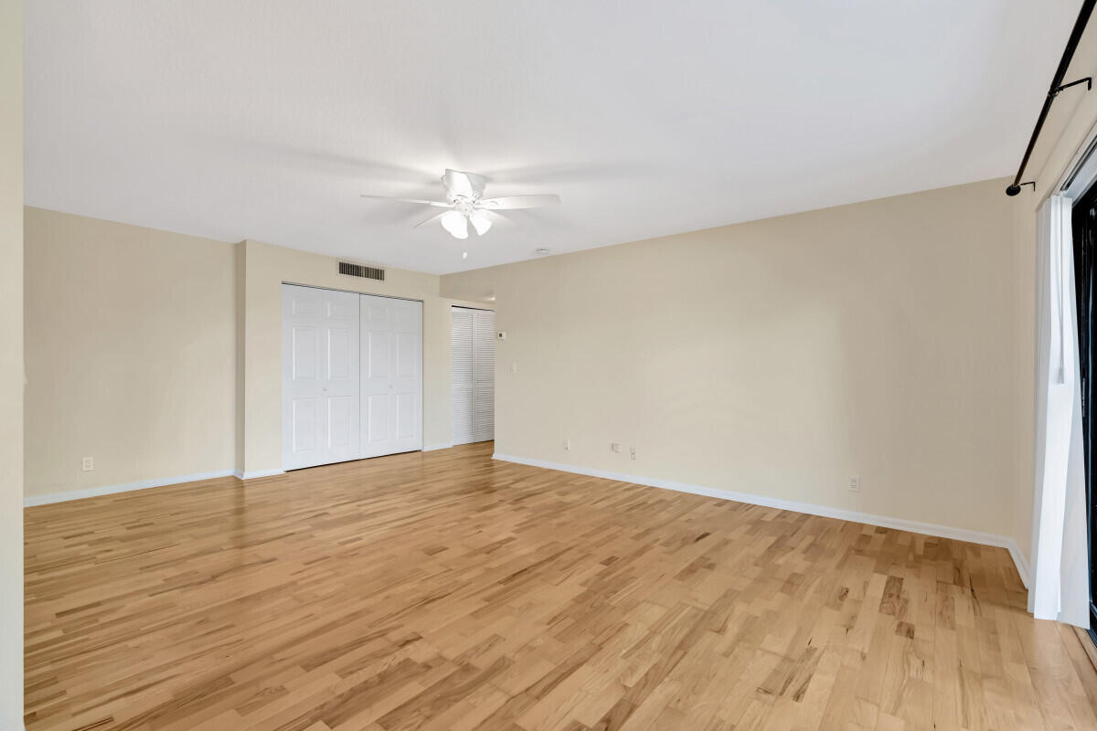 150 Pineview Road, Unit B2 Jupiter, FL 33469 - Photo 12 of 13 a view of empty room with wooden floor