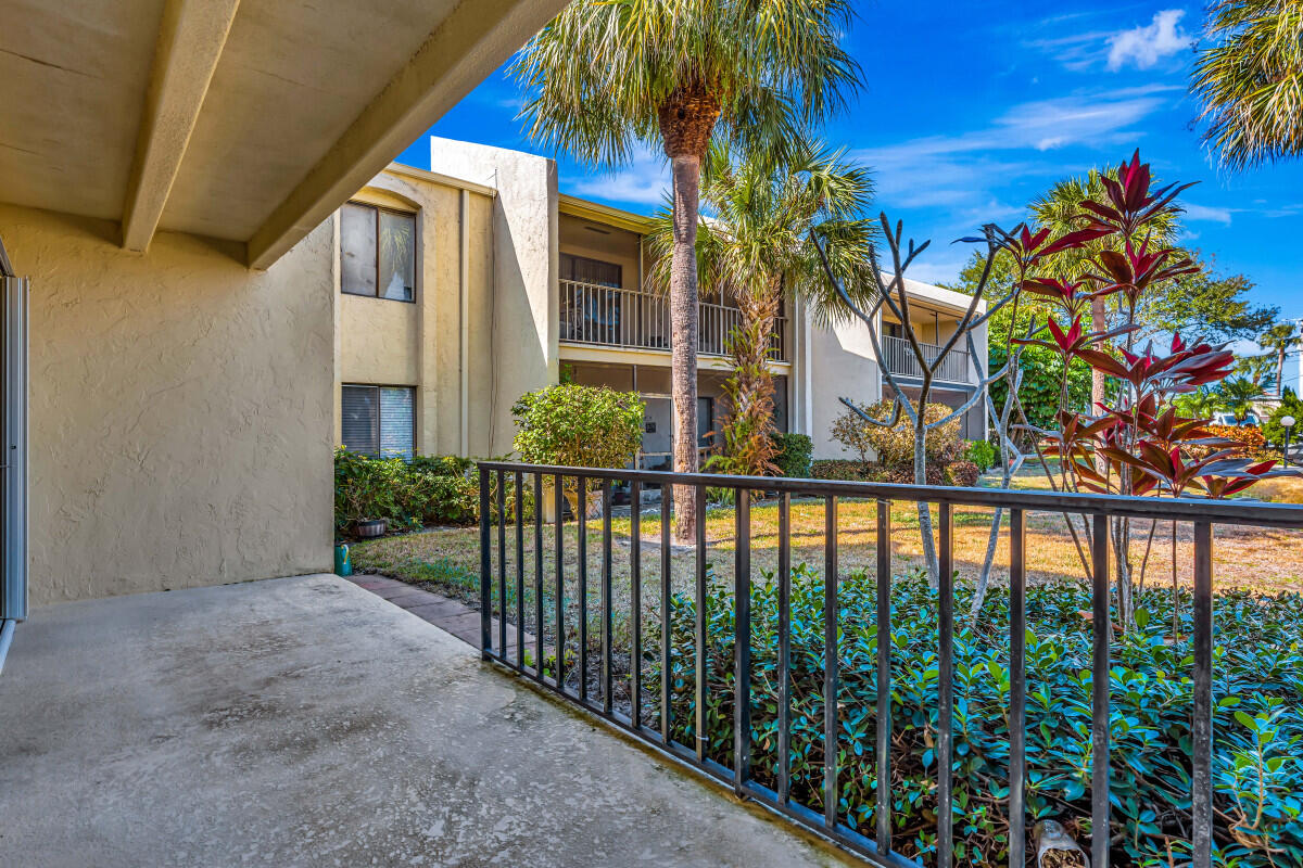 150 Pineview Road, Unit B2 Jupiter, FL 33469 - Photo 5 of 13 a view of a house with a balcony
