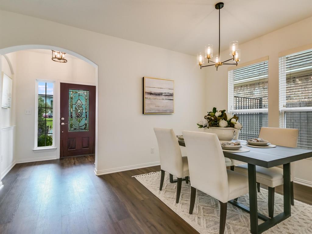 736 Bonnet Boulevard Georgetown, TX 78628 - Photo 3 of 27 a view of a dining room with furniture window and wooden floor