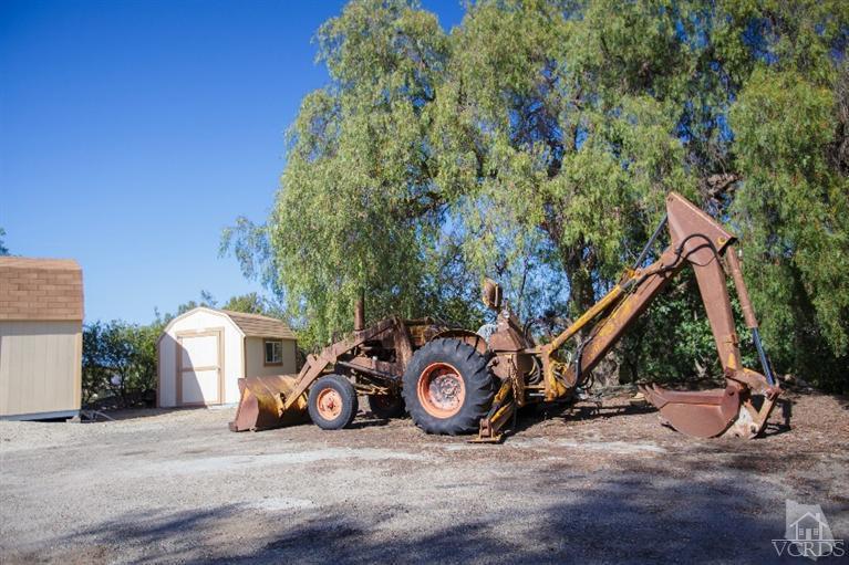 1815 La Granada Drive Thousand Oaks, CA 91362 - Photo 26 of 38 a view of a backyard with a table and chairs