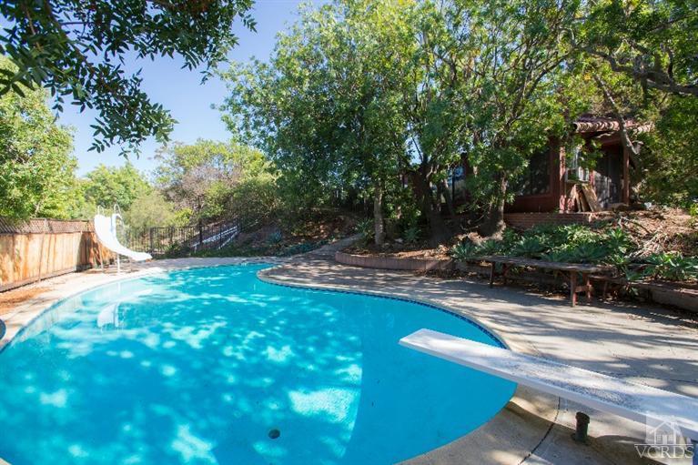 1815 La Granada Drive Thousand Oaks, CA 91362 - Photo 30 of 38 a view of a backyard with plants and a patio