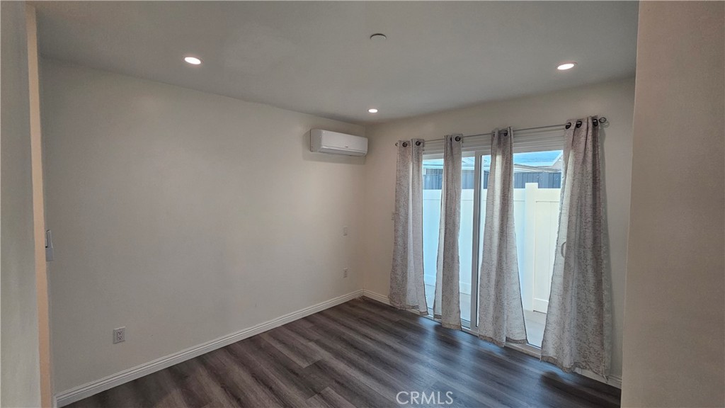 1203 Shorb Alhambra, CA 91803 - Photo 15 of 22 a view of wooden floor and windows in a room