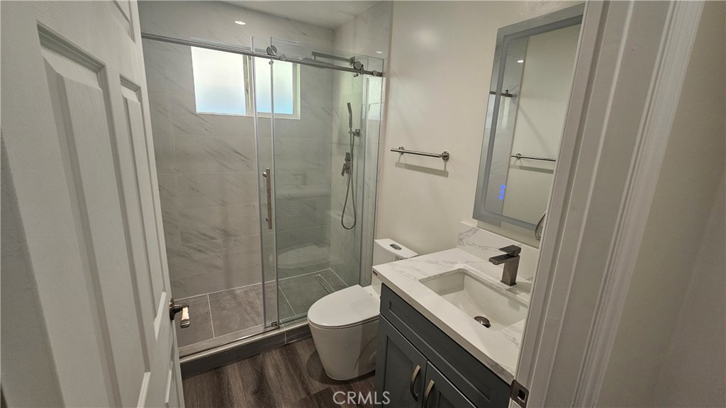 1203 Shorb Alhambra, CA 91803 - Photo 18 of 22 a bathroom with a sink a toilet and shower