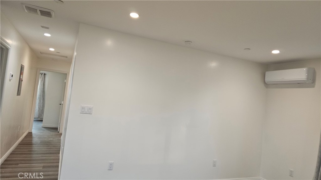 1203 Shorb Alhambra, CA 91803 - Photo 5 of 22 a view of a hallway with wooden floor