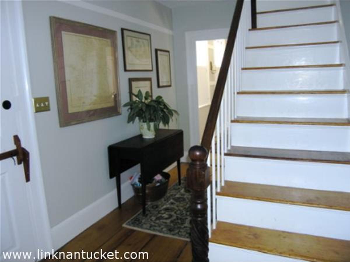 16 Vestal Street Nantucket, MA 02554 - Photo 4 of 10 a view of entryway and hall with wooden floor