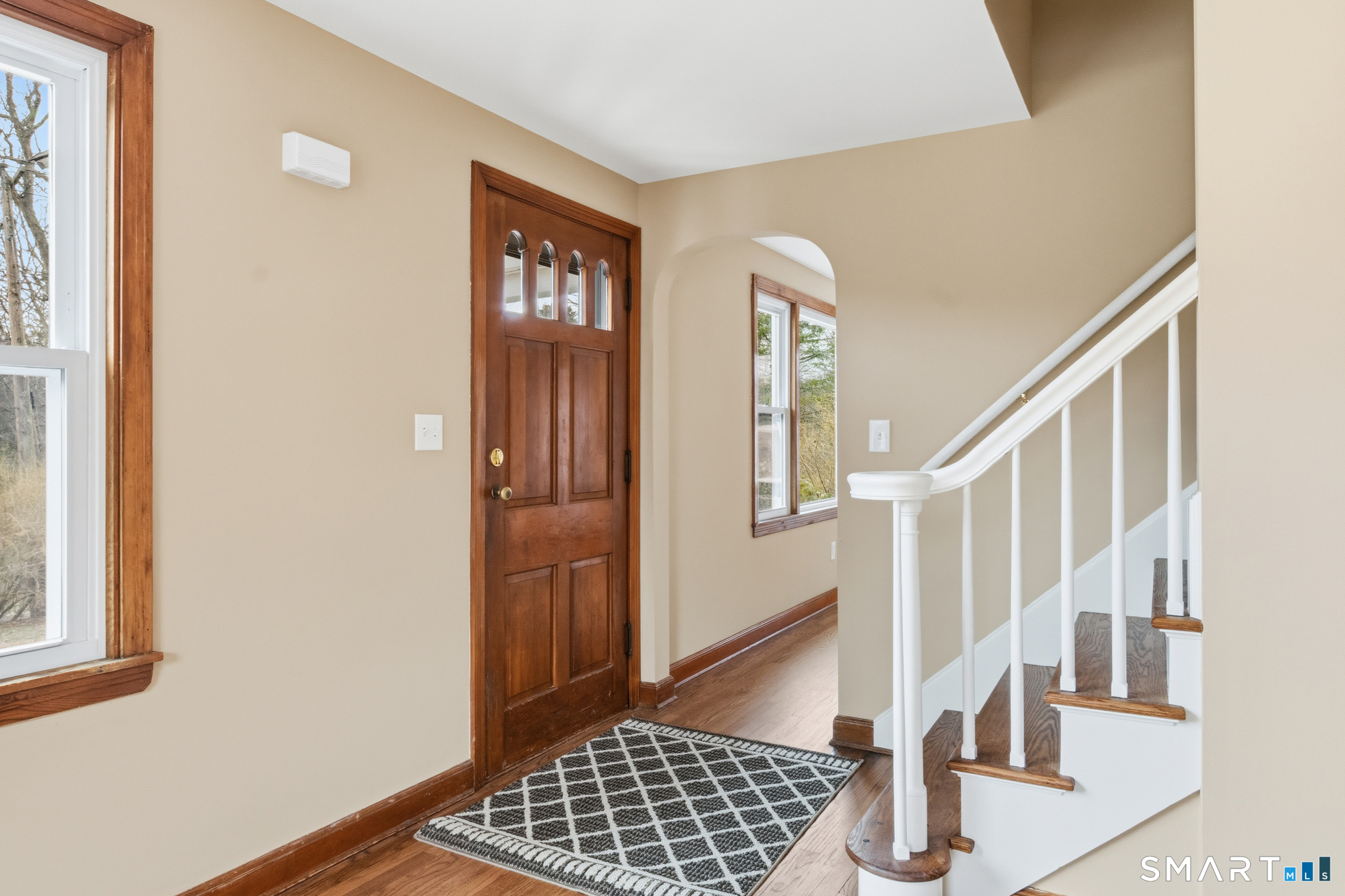 217 East Waterbury Road Naugatuck, CT 06770 - Photo 11 of 38 a view of entryway with wooden floor and a livingroom