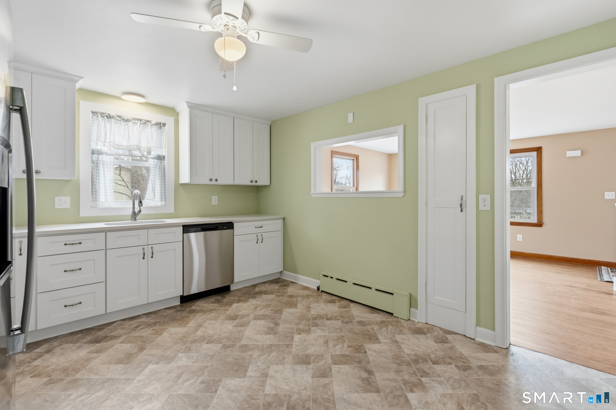 217 East Waterbury Road Naugatuck, CT 06770 - Photo 2 of 38 a view of cabinets a window and a kitchen