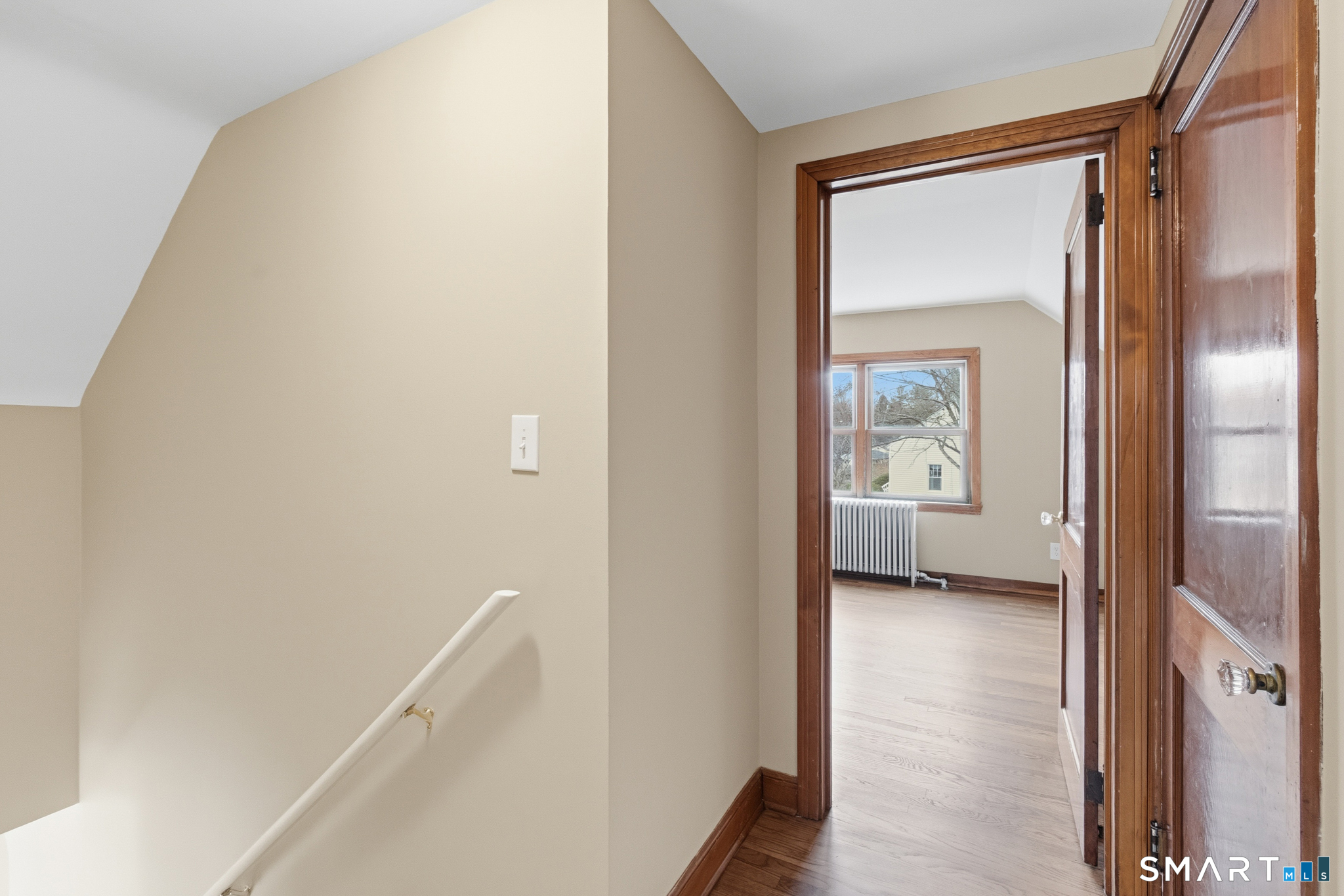 217 East Waterbury Road Naugatuck, CT 06770 - Photo 22 of 38 a view of a hallway with a livingroom and a bathroom