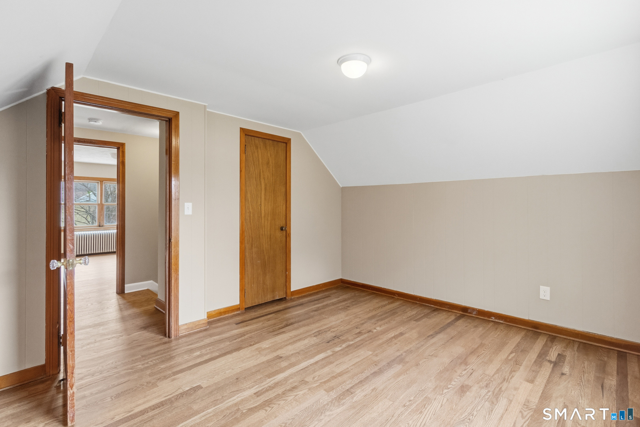 217 East Waterbury Road Naugatuck, CT 06770 - Photo 23 of 38 wooden floor in an empty room with a window