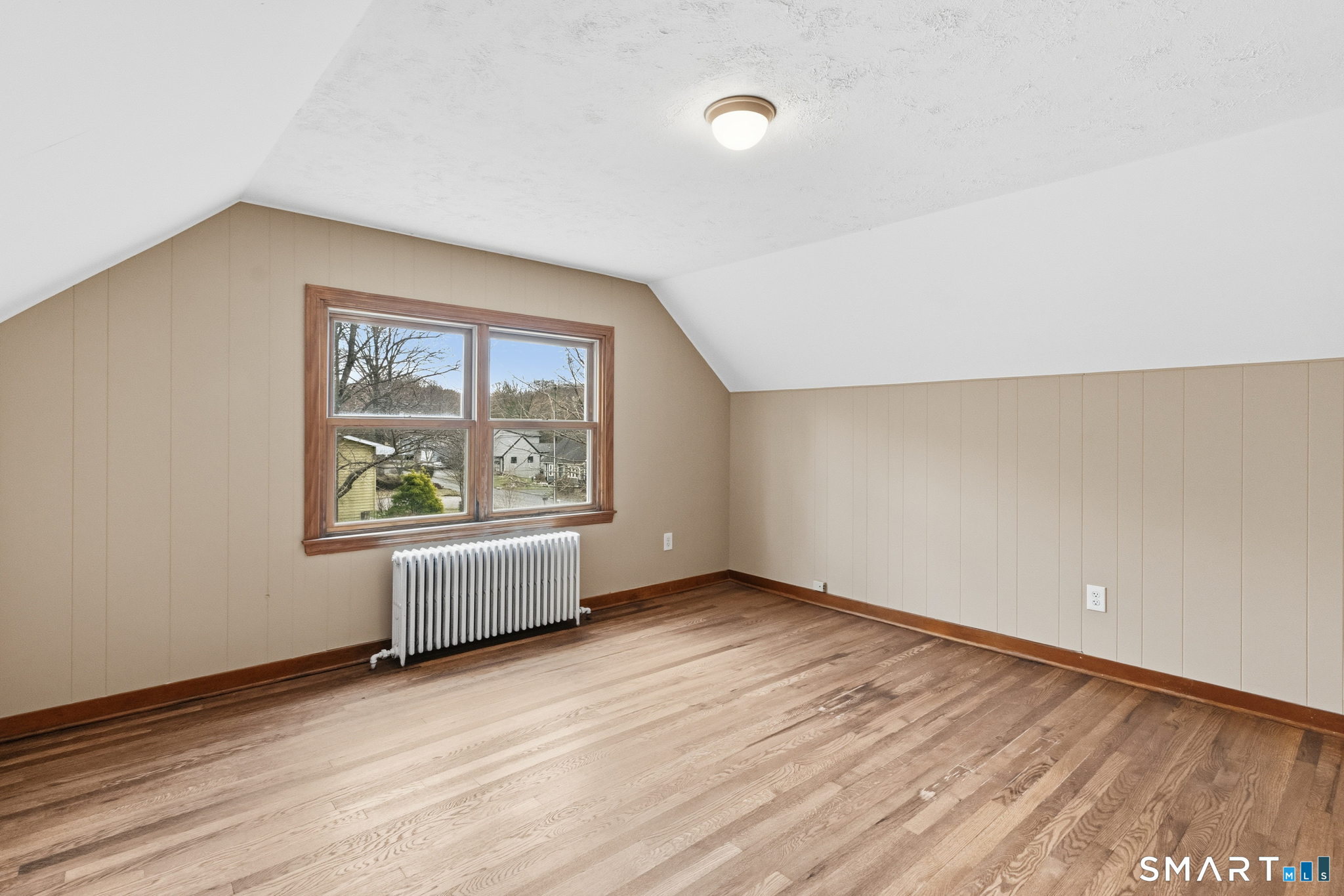 217 East Waterbury Road Naugatuck, CT 06770 - Photo 28 of 38 an empty room with wooden floor and windows