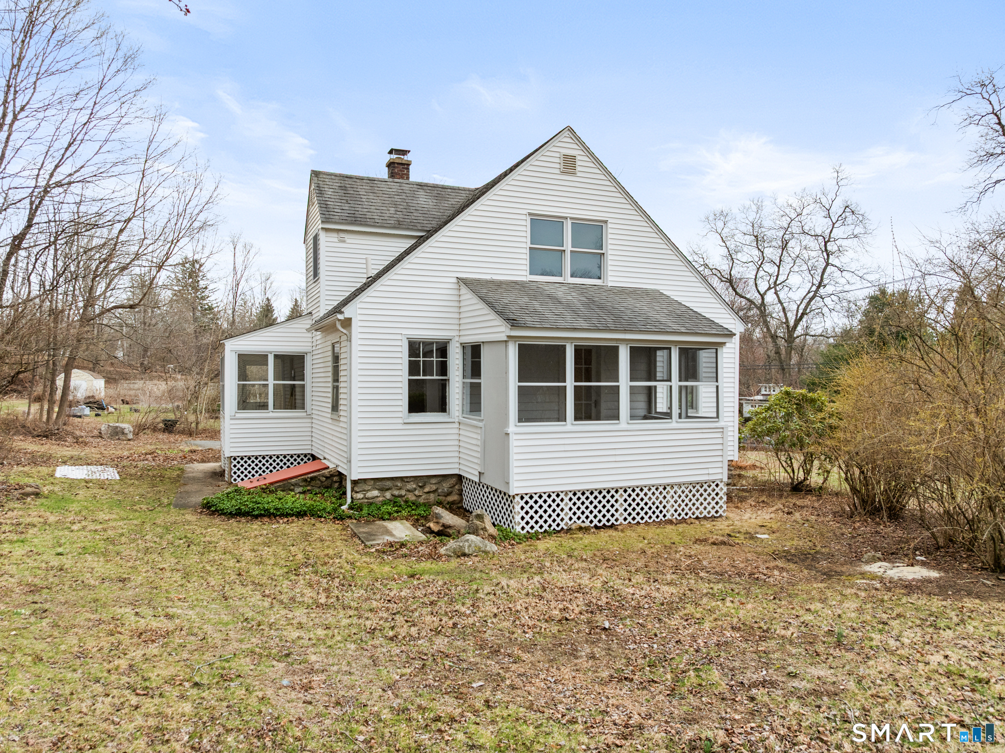 217 East Waterbury Road Naugatuck, CT 06770 - Photo 36 of 38 a front view of a house with a yard