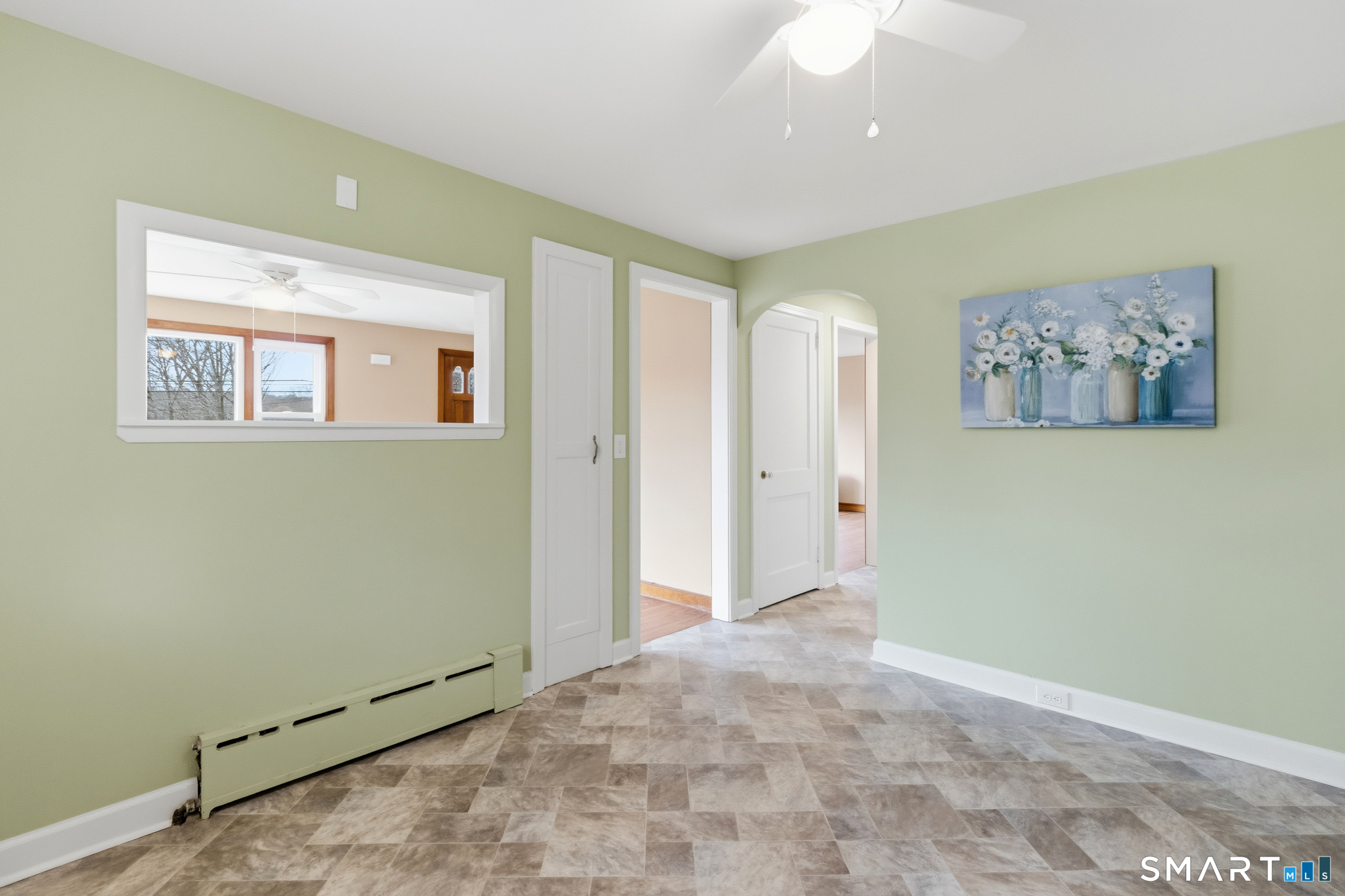 217 East Waterbury Road Naugatuck, CT 06770 - Photo 5 of 38 a view of an empty room with a window