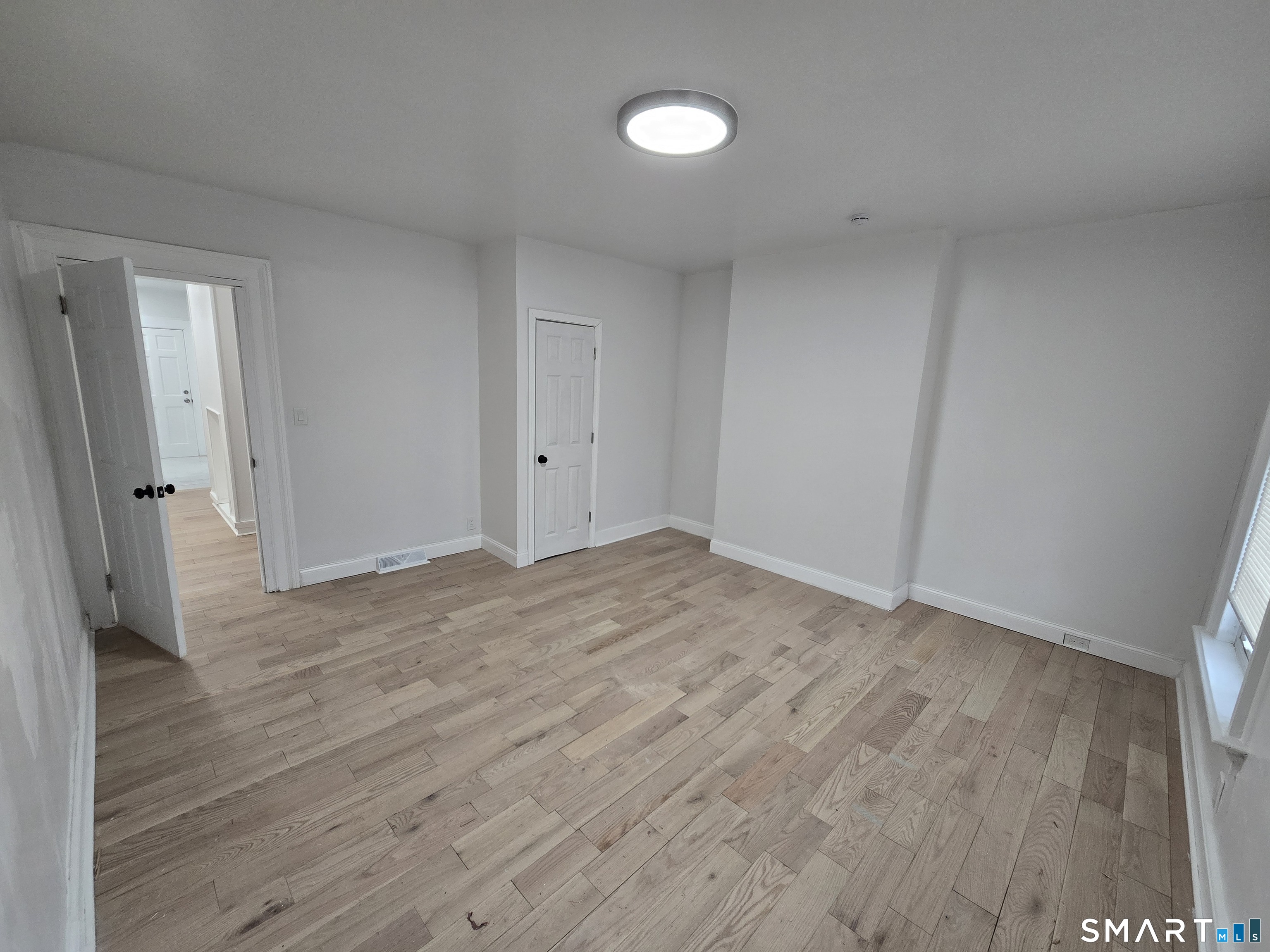 80 Dickerman Street New Haven, CT 06511 - Photo 4 of 31 wooden floor in an empty room