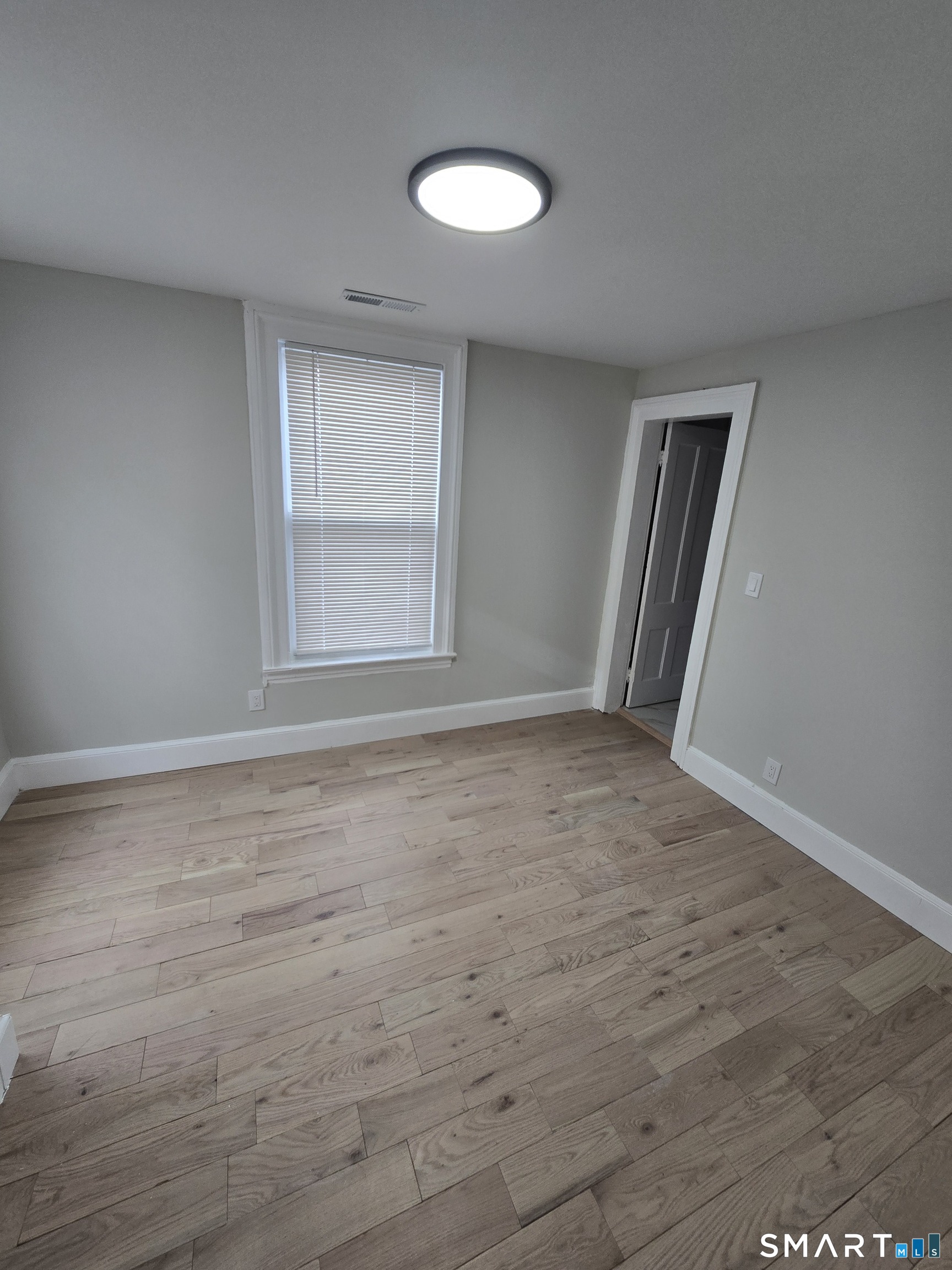 80 Dickerman Street New Haven, CT 06511 - Photo 10 of 31 a view of an empty room with a window