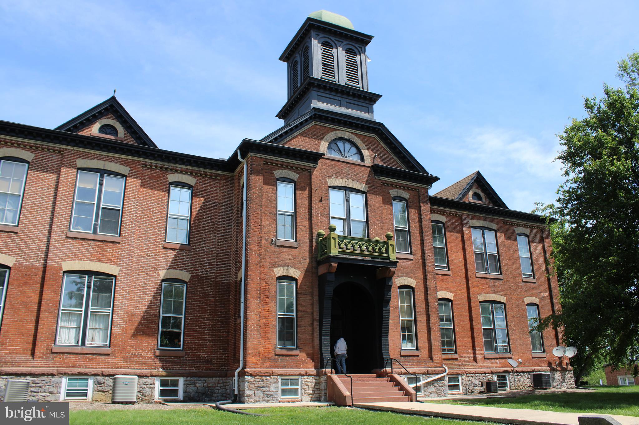 745 Manor Street, Unit 2 Columbia, PA 17512 - Photo 1 of 13 a front view of a house with a yard