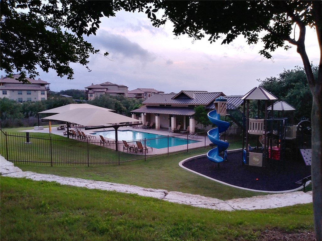 348 Stone View Trail Austin, TX 78737 - Photo 26 of 26 Community pool, playscape and common area