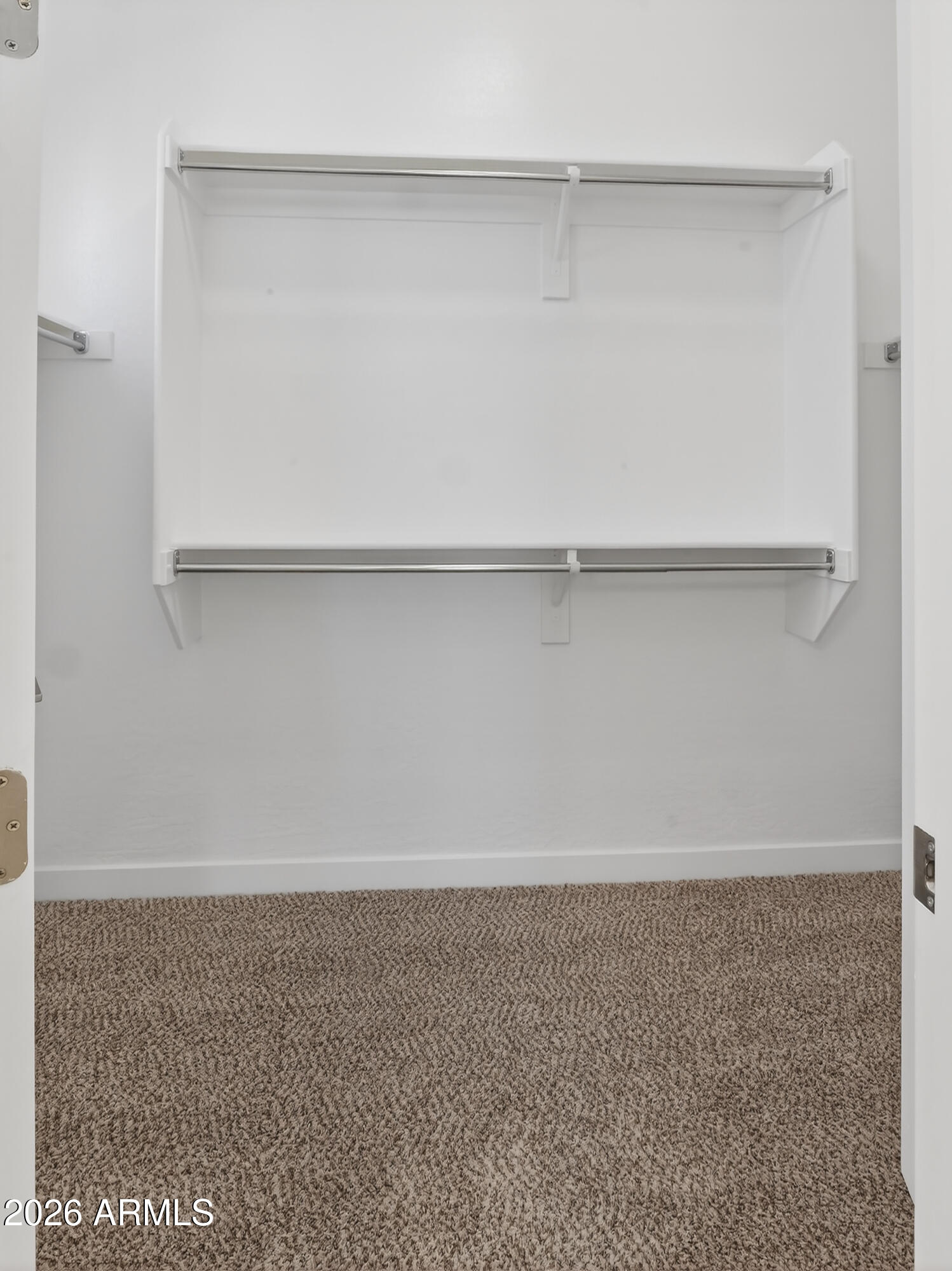 810 East Hopi Trail Phoenix, AZ 85042 - Photo 20 of 48 a view of an empty walk in closet