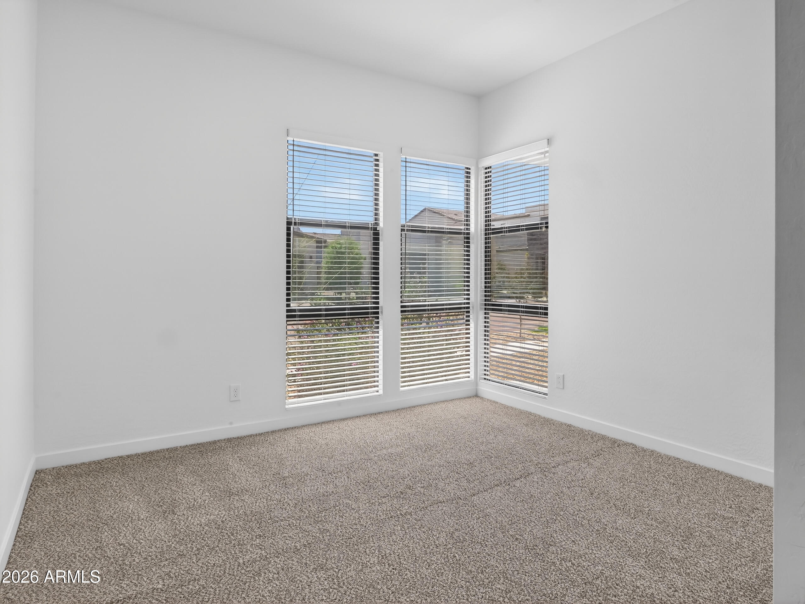 810 East Hopi Trail Phoenix, AZ 85042 - Photo 22 of 48 a view of empty room with windows