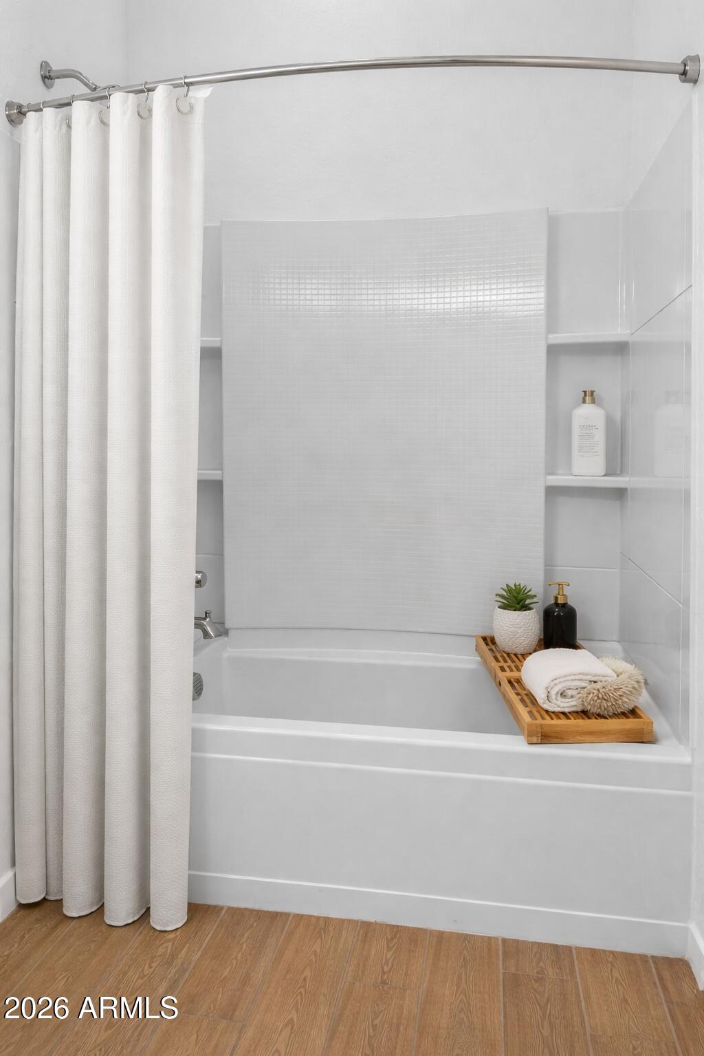 810 East Hopi Trail Phoenix, AZ 85042 - Photo 25 of 48 a bathroom with a bathtub and a shower
