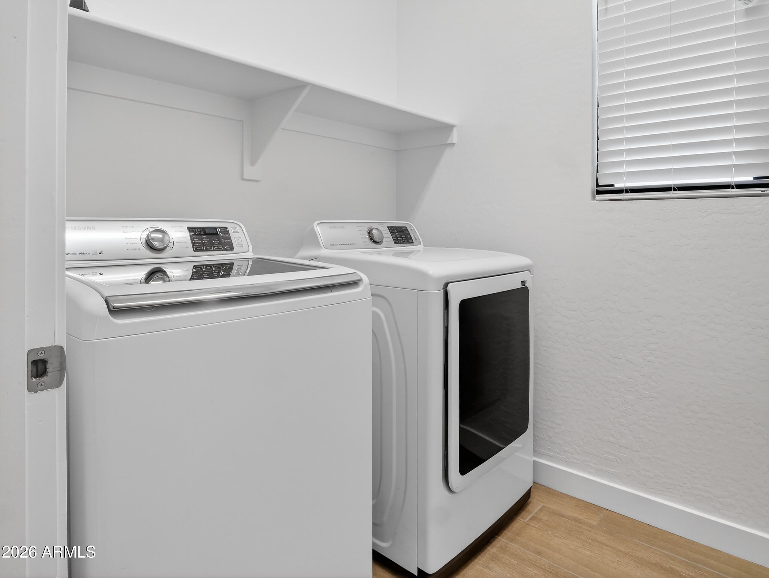 810 East Hopi Trail Phoenix, AZ 85042 - Photo 30 of 48 a utility room with dryer and washer