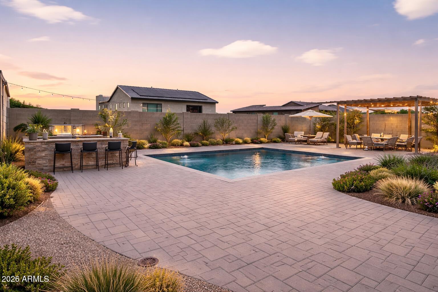 810 East Hopi Trail Phoenix, AZ 85042 - Photo 32 of 48 a view of a swimming pool and lounge chair