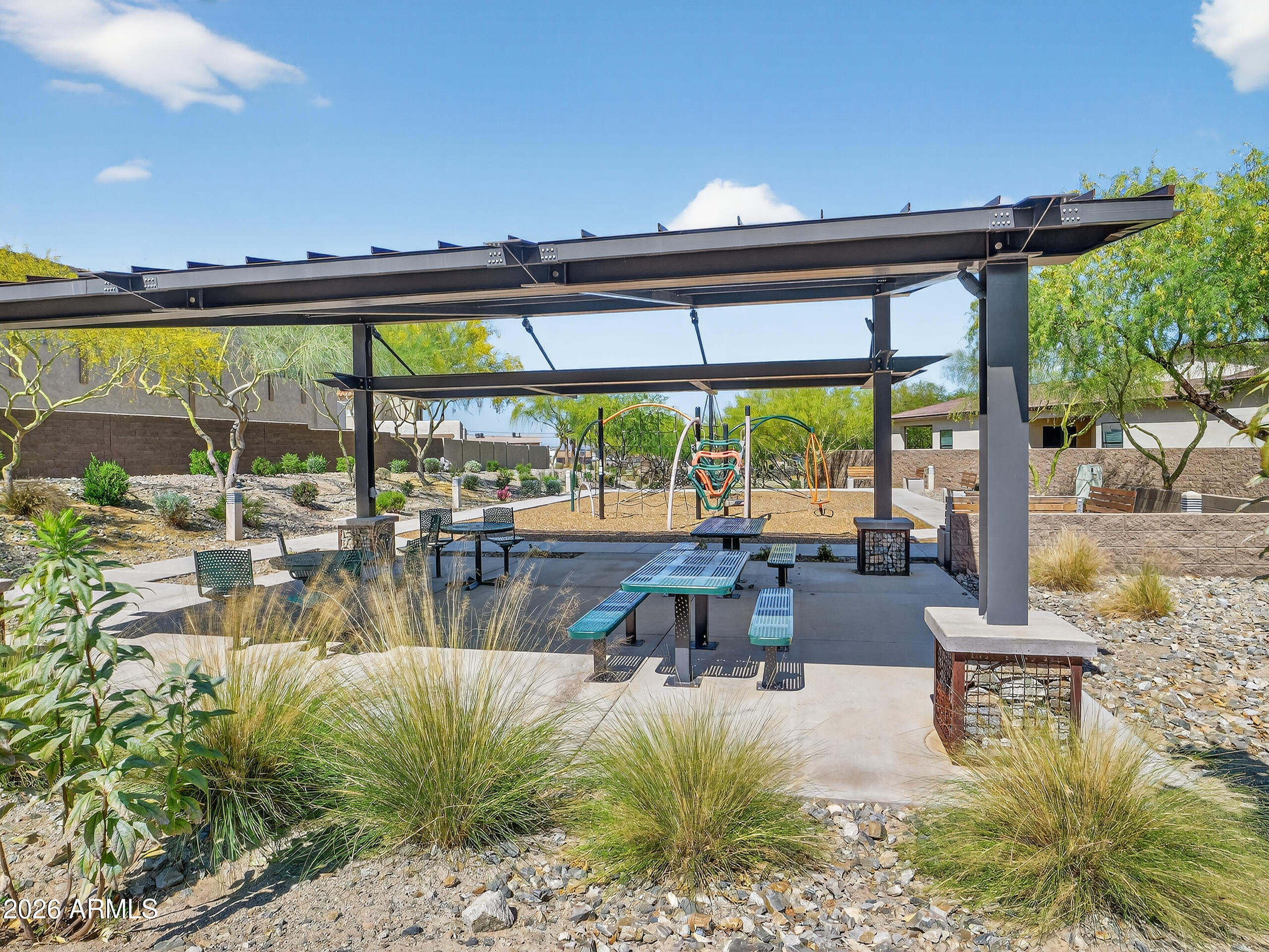 810 East Hopi Trail Phoenix, AZ 85042 - Photo 45 of 48 a view of swimming pool with outdoor seating