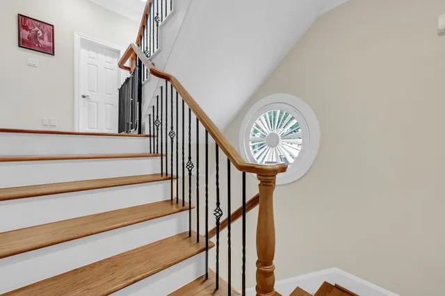 a view of a dining room with furniture and window
