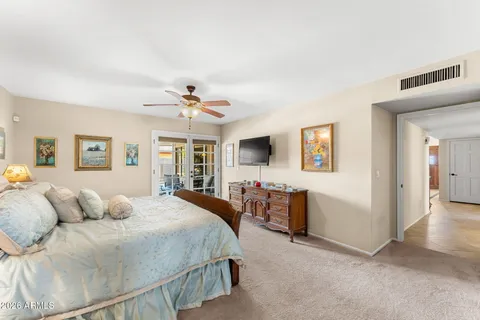 a kitchen with a stove a sink and a refrigerator