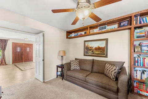 a kitchen with sink stove and cabinets