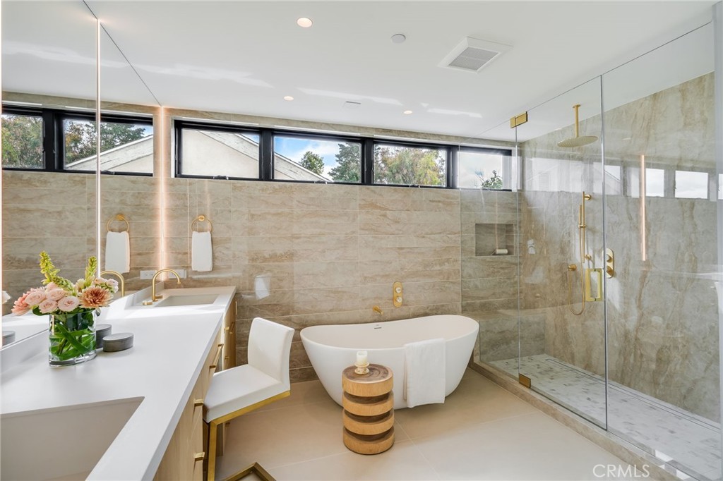 427 Santa Ana Avenue Newport Beach, CA 92663 - Photo 14 of 32 a bathroom with a bathtub and shower