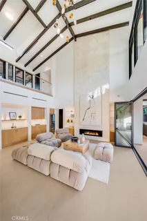 a bedroom with a large bed and a rug