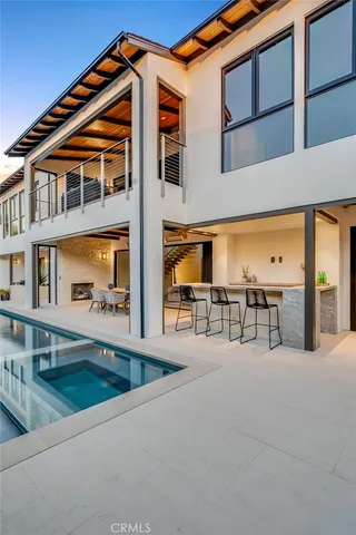 an aerial view of a house with a garden and plants