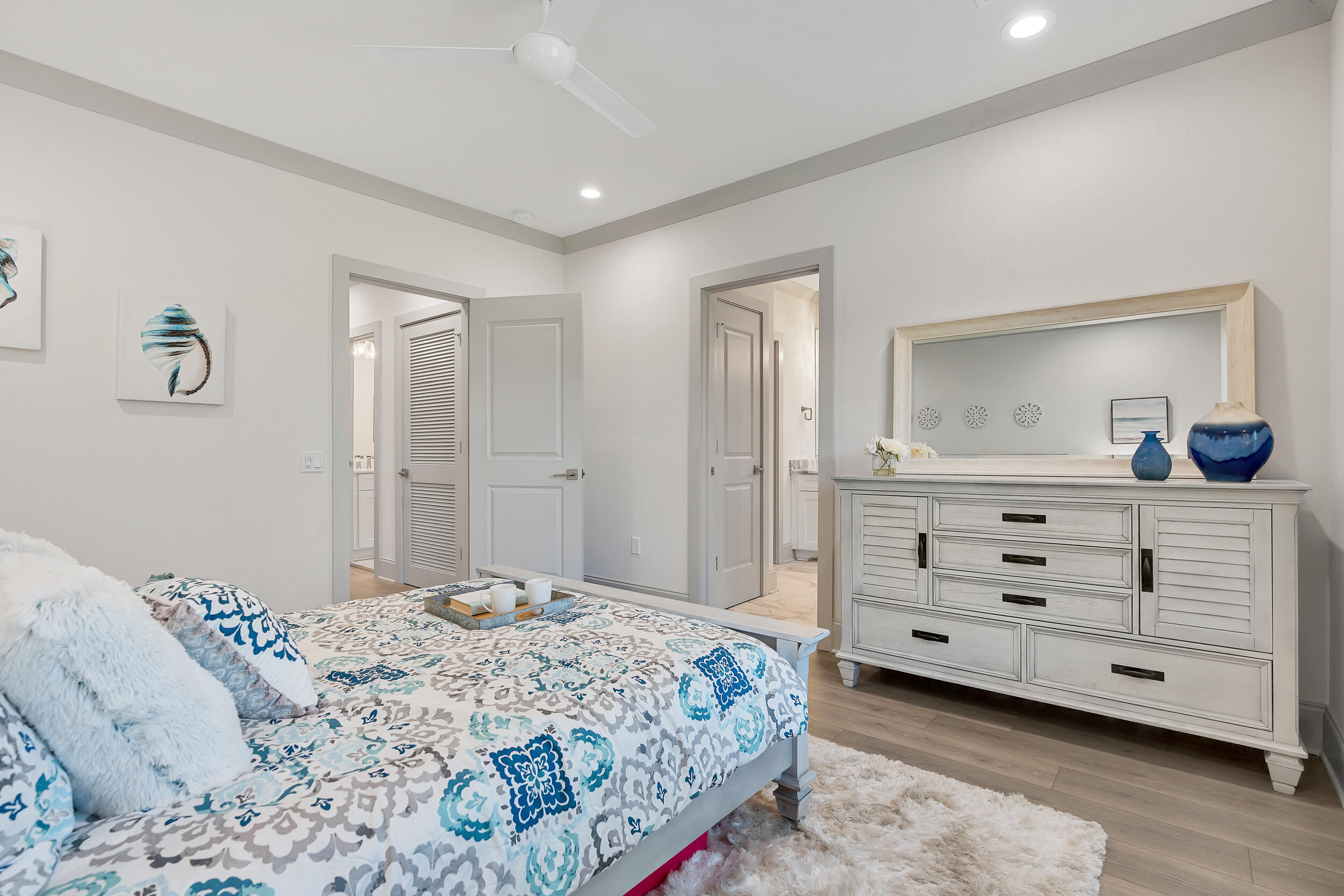 55 Golden Bell Ct Inlet Beach, Unit 55C Inlet Beach, FL 32461 - Photo 23 of 47 a bedroom with a bed and a dresser