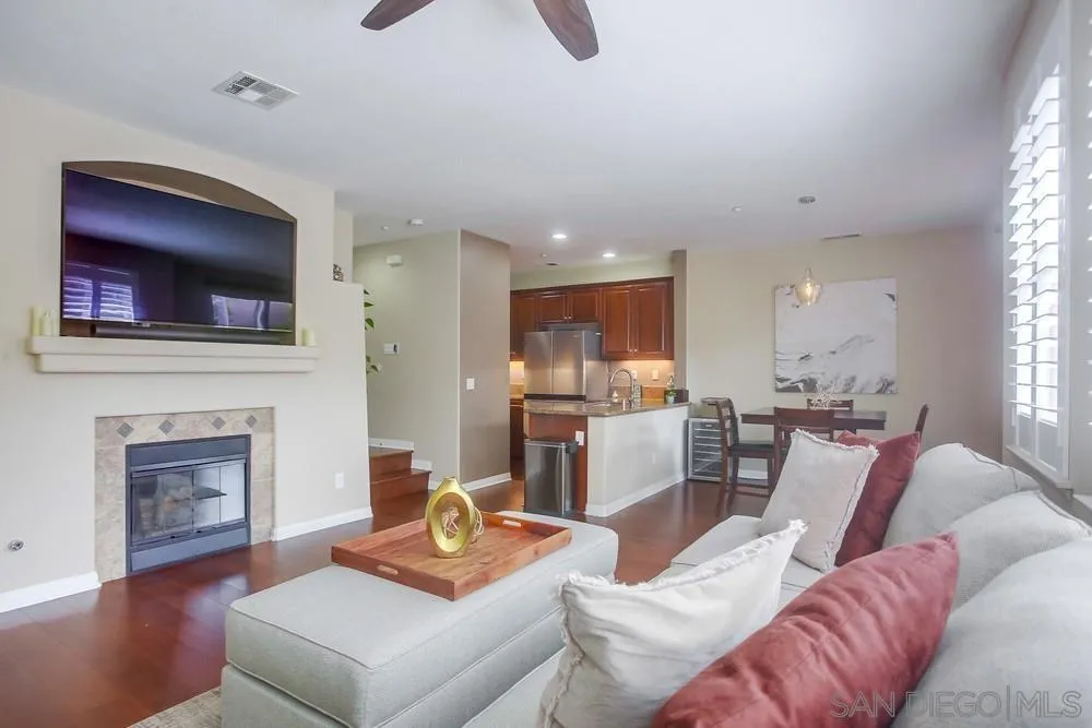 4115 Karst Road Carlsbad, CA 92010 - Photo 14 of 43 a living room with furniture and a fireplace