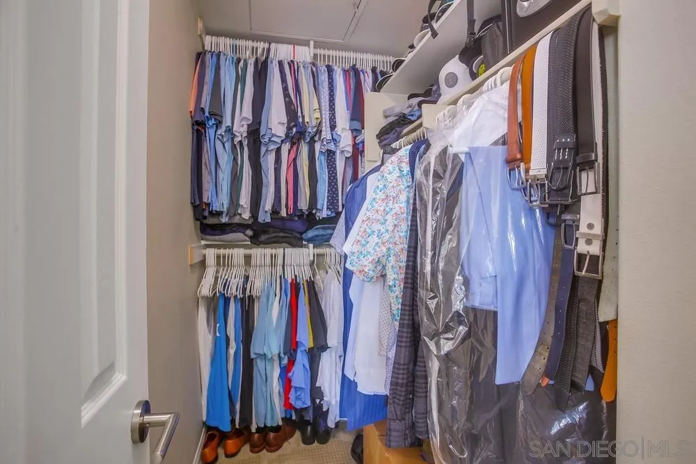 4115 Karst Road Carlsbad, CA 92010 - Photo 27 of 43 a view of walk in closet with clothes